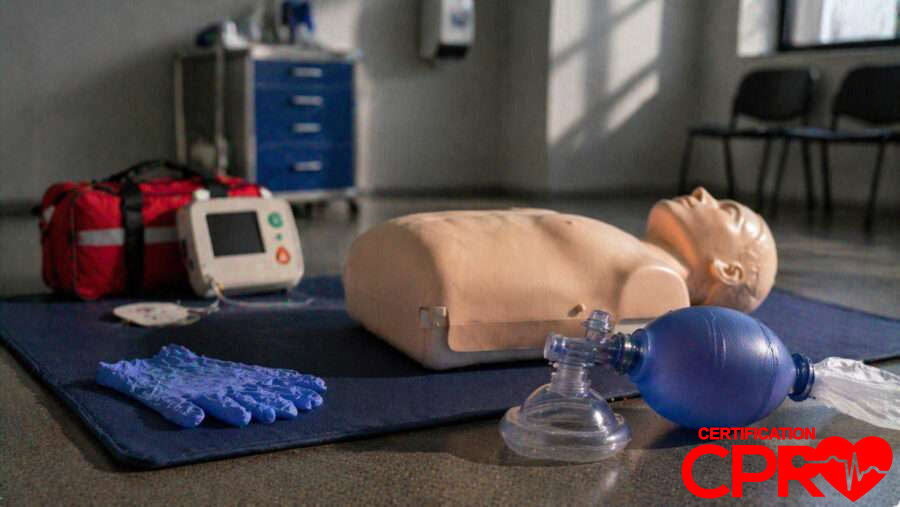 CPR training manikin with AED and rescue mask for certification in Austin.