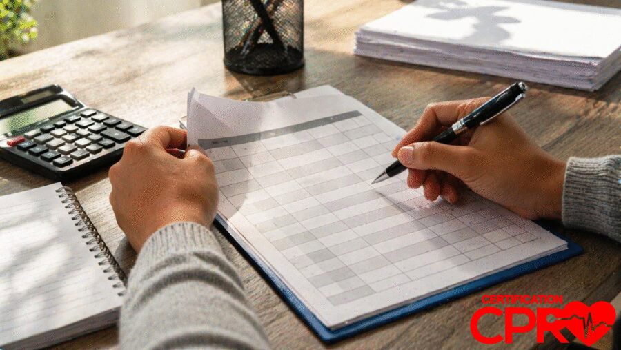 Person filling out a form for CPR certification in Austin, Texas.